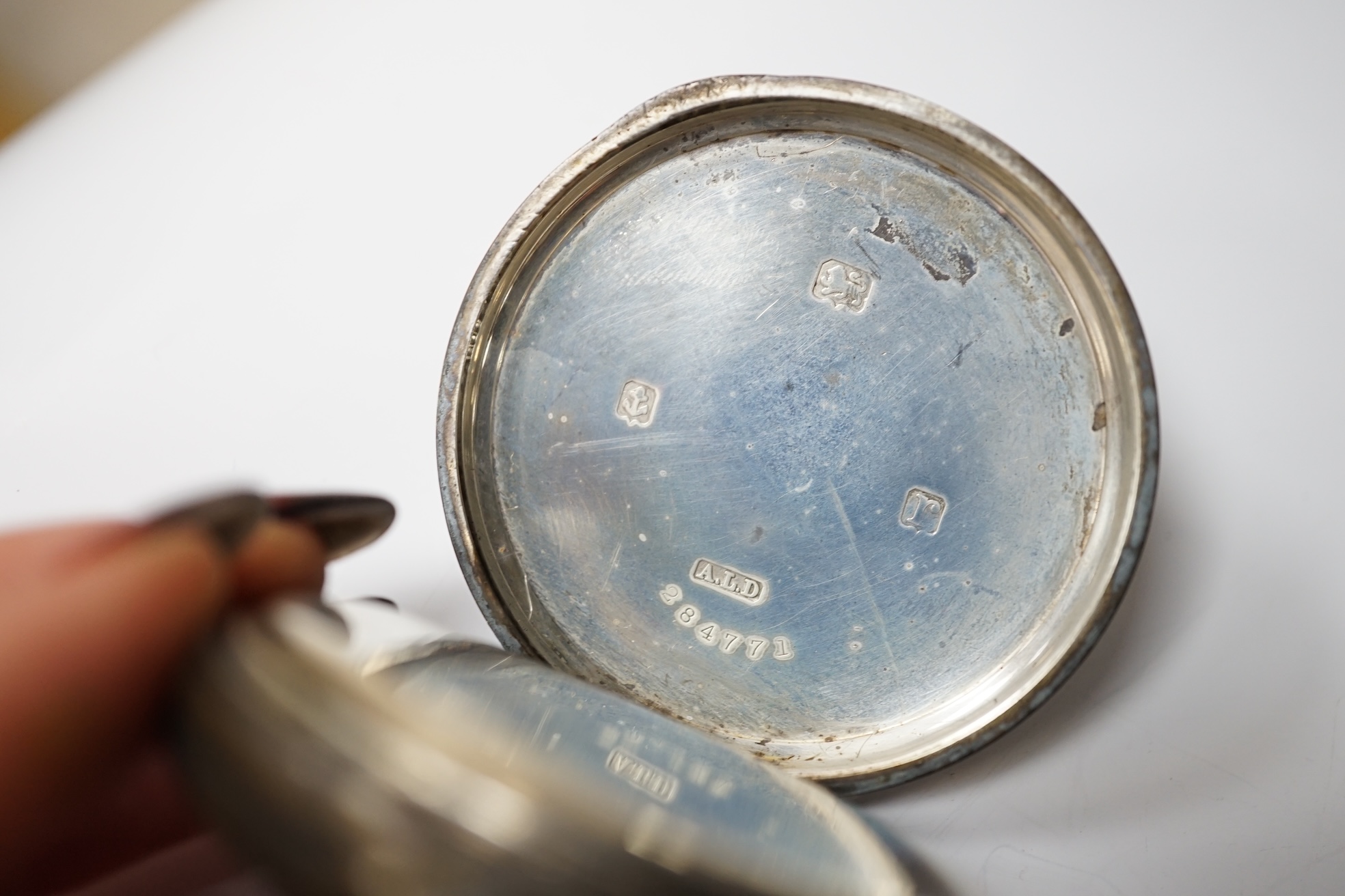 A Victorian silver open face keywind pocket watch by Davies of Ebbe Vale and one other late silver pocket watch. Condition - poor